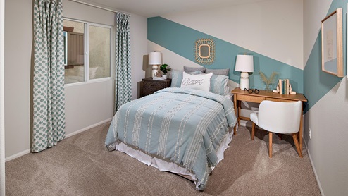 Fully furnished bedroom with plush carpet