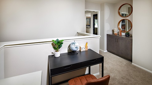 Upstairs loft area with plush carpet