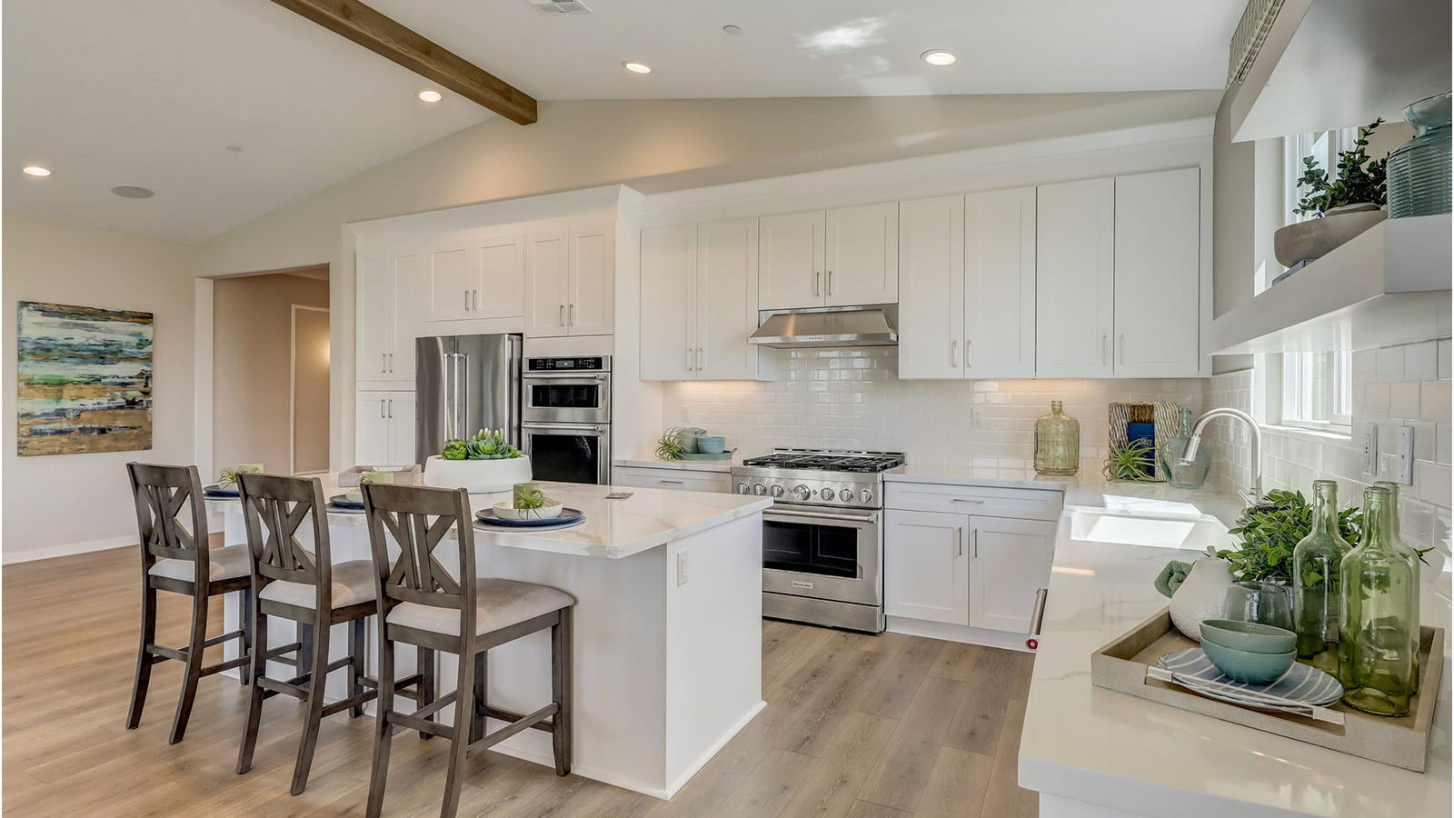 Kitchen with quartz countertops and stainless steel appliances