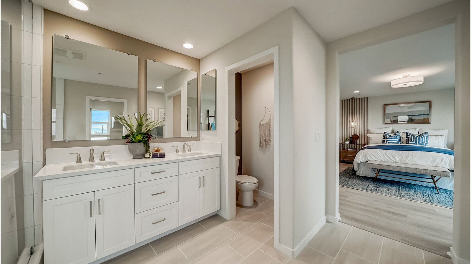 Primary bathroom with dual vanities