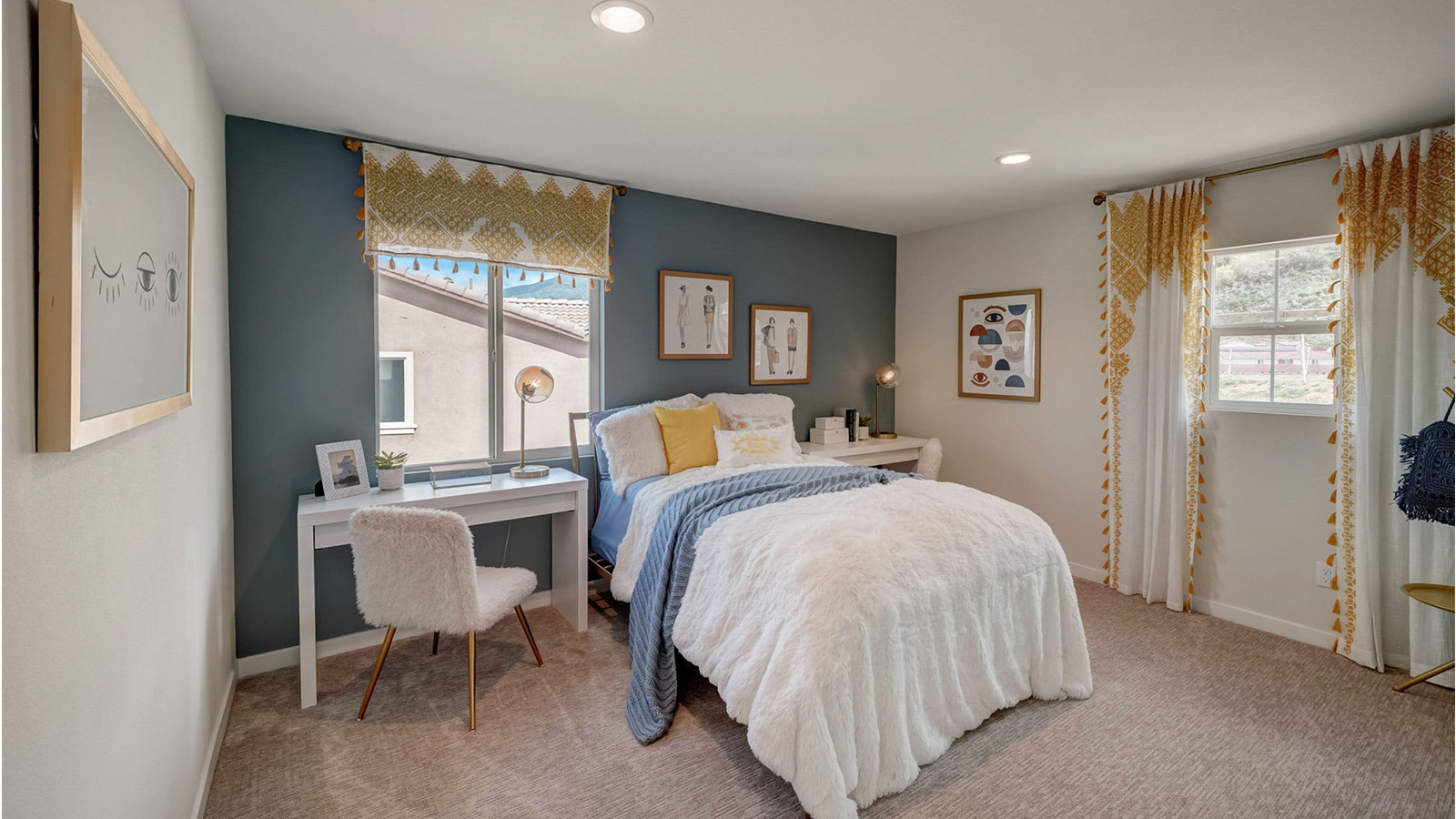 Secondary bedroom with full bed and desk