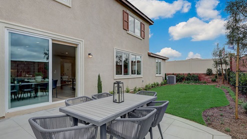 Spacious backyard with patio area