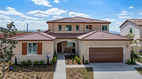 Two-story tuscan home with two-car garage
