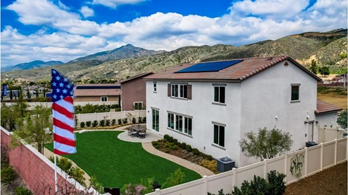 Spacious backyard with patio area