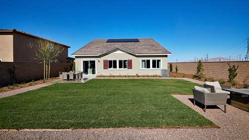 Spacious backyard with large lawn area