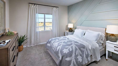 Fully furnished bedroom with plush carpet