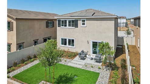Spacious backyard with patio area