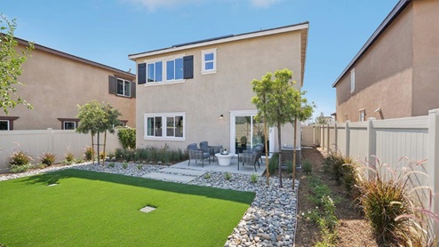 Spacious backyard with patio area