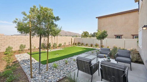 Spacious backyard with patio area