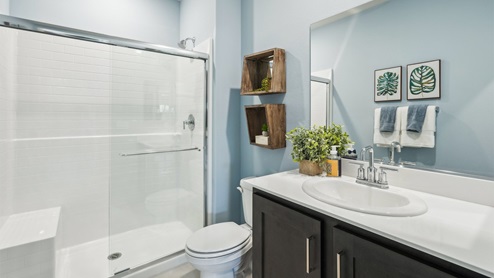 Bathroom with vanity and shower