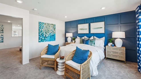 Primary bedroom with plush carpet