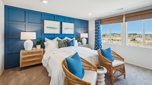 Primary bedroom with plush carpet