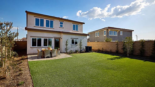 Spacious backyard with patio area