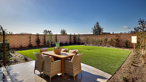 Spacious backyard with patio area