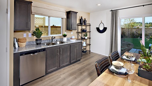 Open-concept kitchen with stainless steel appliances