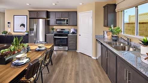 Open-concept kitchen with stainless steel appliances