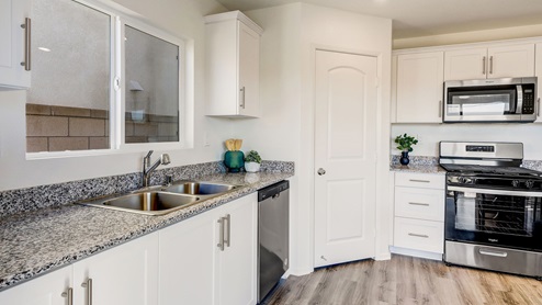 Open-concept with stainless steel appliances