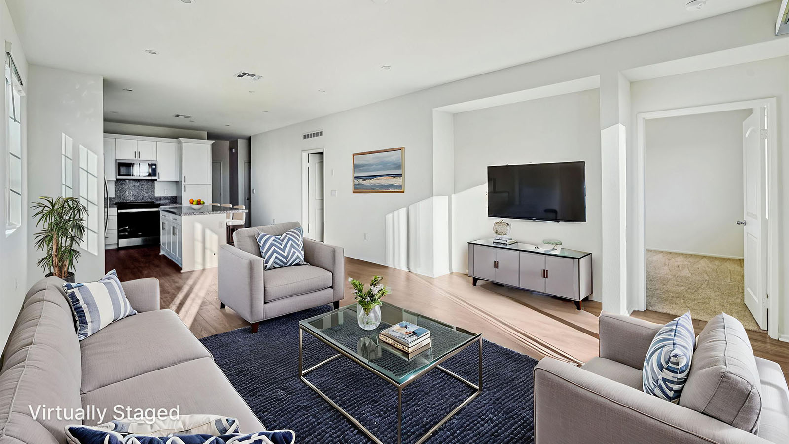 Great room with laminate wood flooring