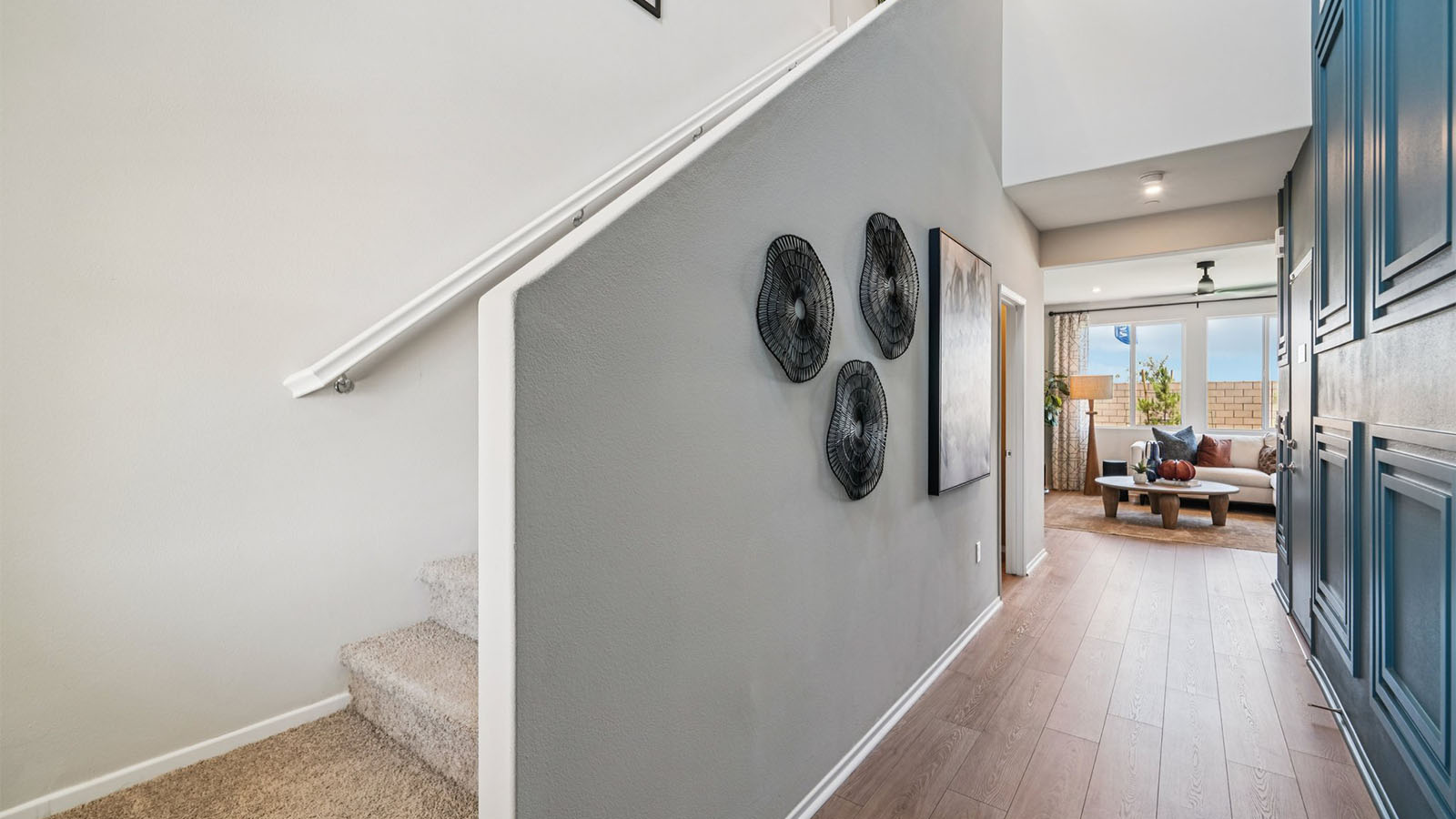 Spacious hallway leading up to stairs