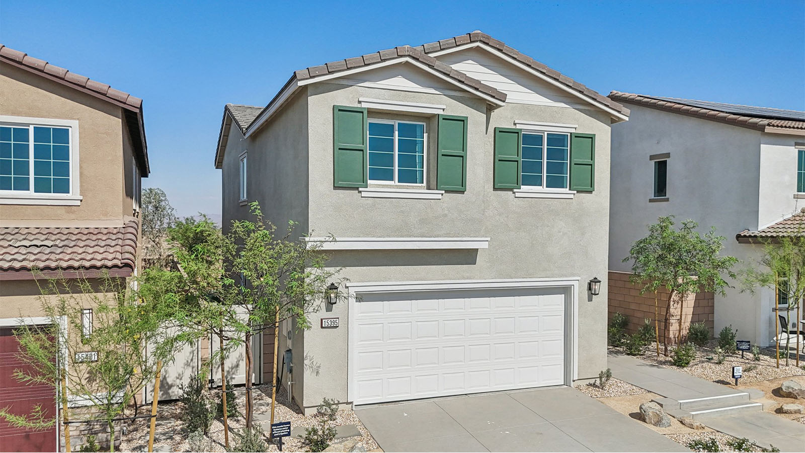 Two-story traditional home and two-car garage