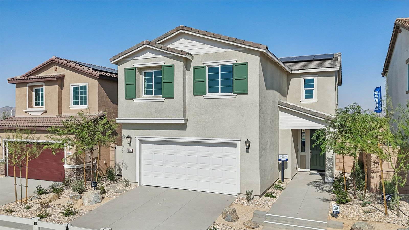 Two-story Spanish home and two-car garage