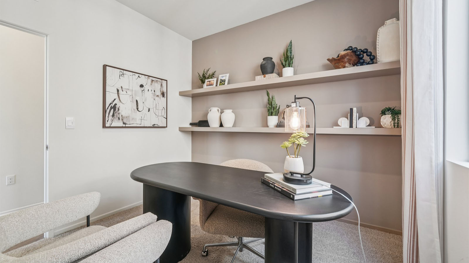 Spacious office area with desk and shelving