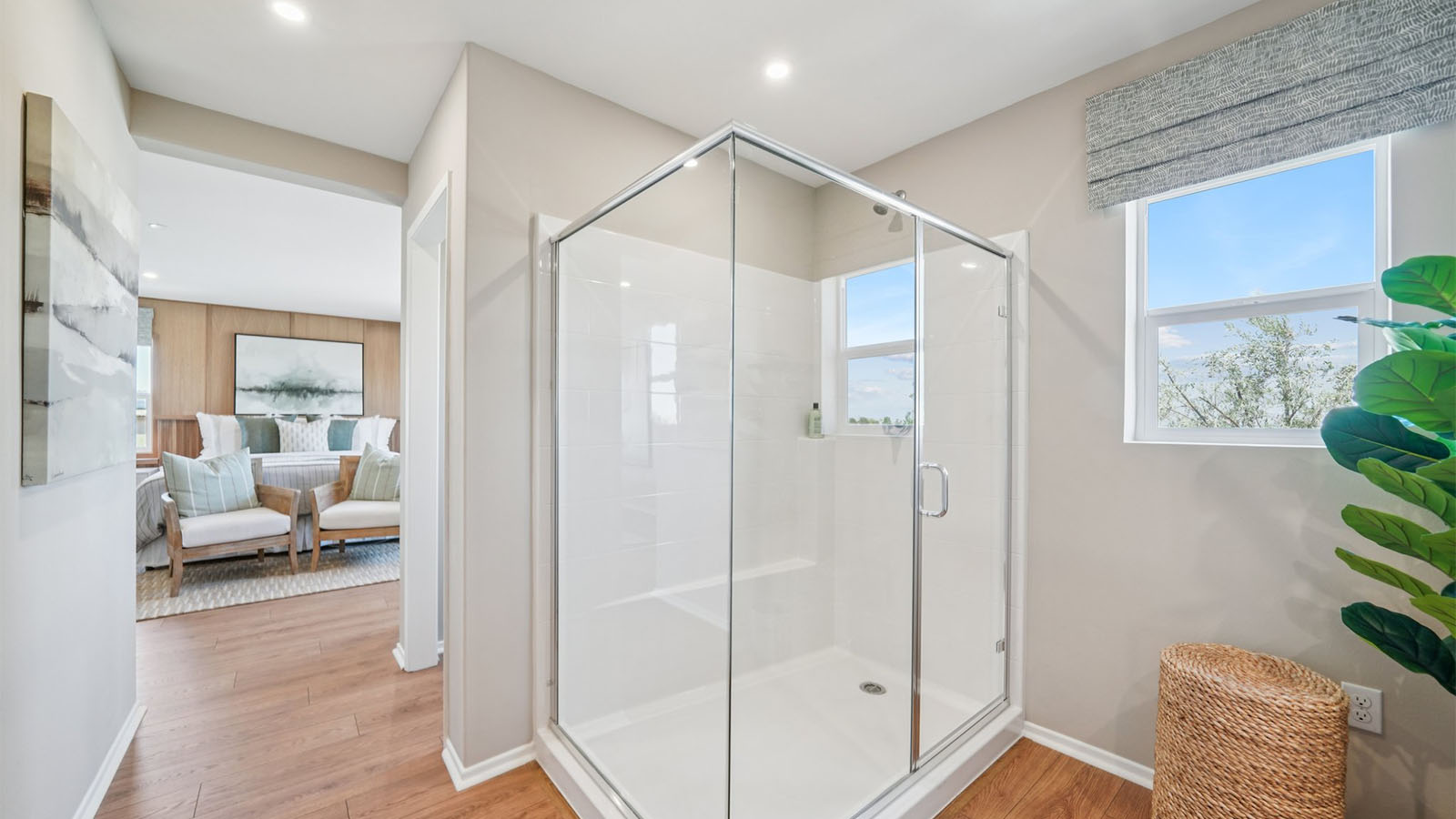 Primary bathroom with shower and primary bedroom view