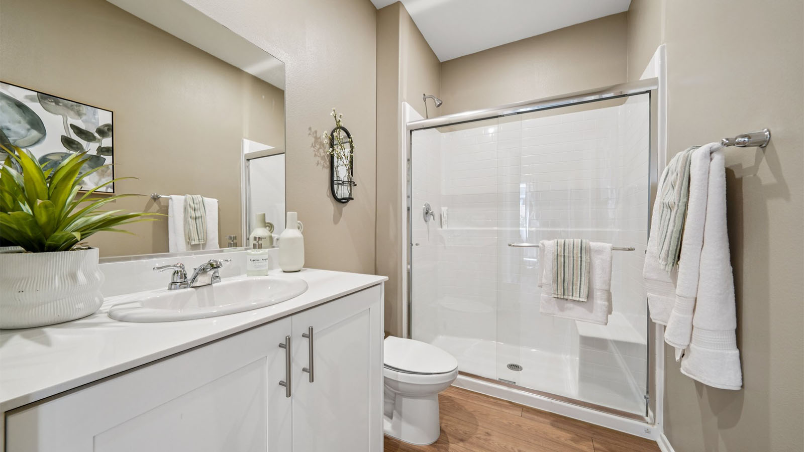Secondary bathroom with vanity and shower