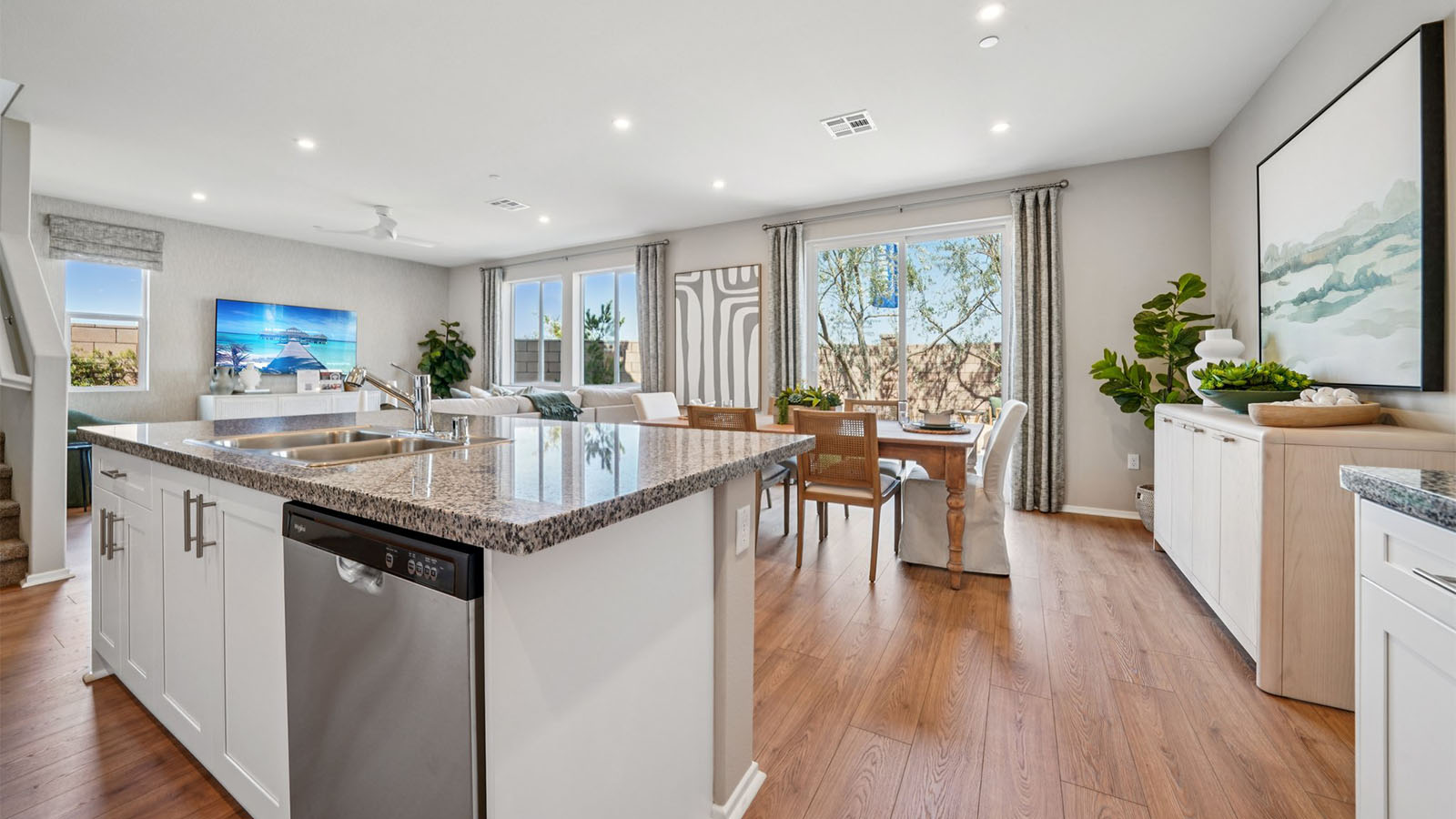 Spacious open-concept great room, dining room and kitchen