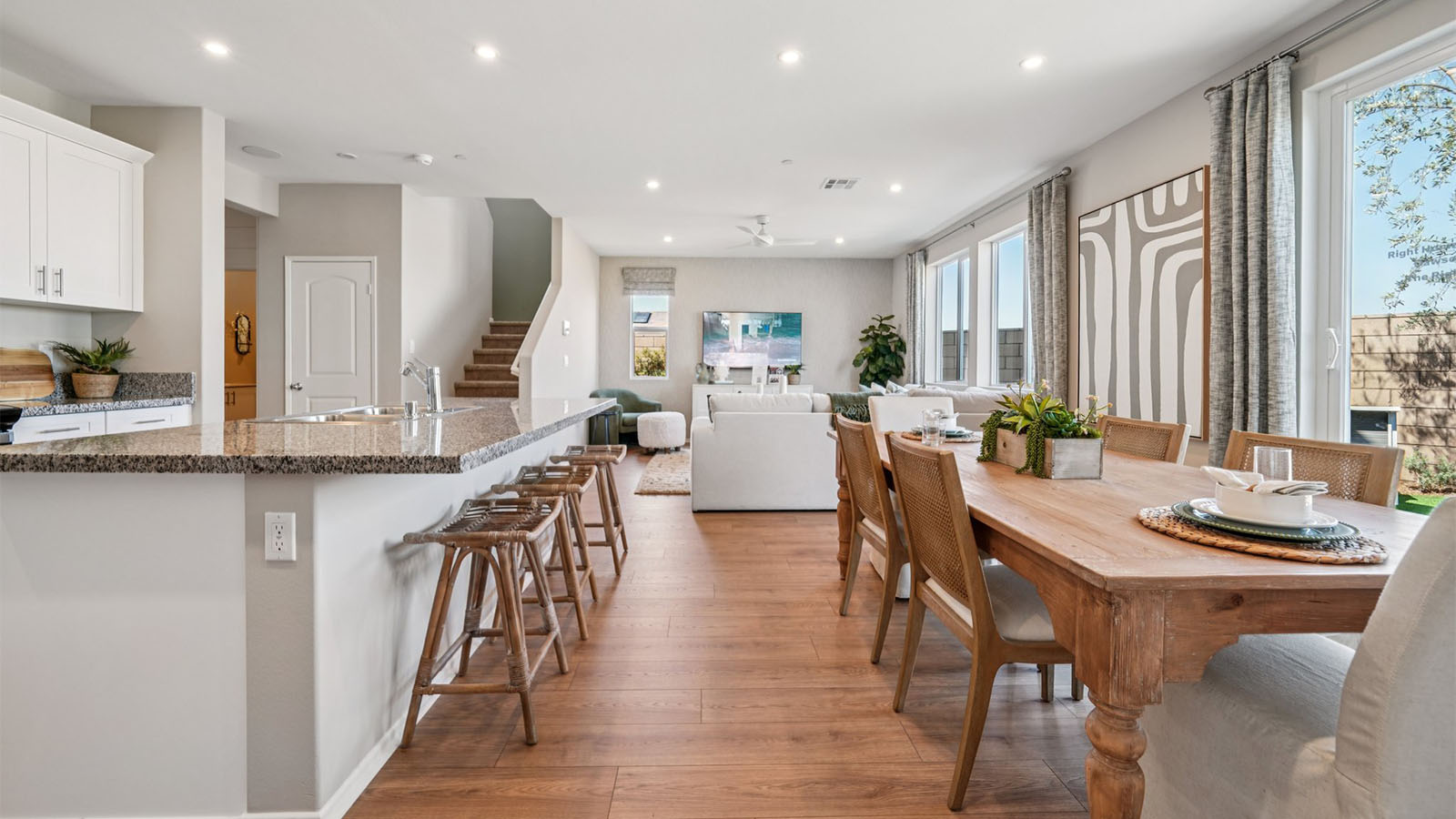 Spacious open-concept great room, dining room and kitchen