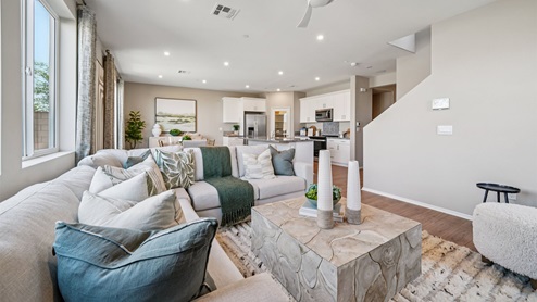 Open-concept great room and dining room area