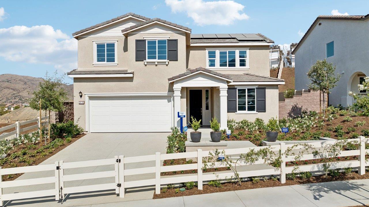 Exterior of a two-story home with a covered entry