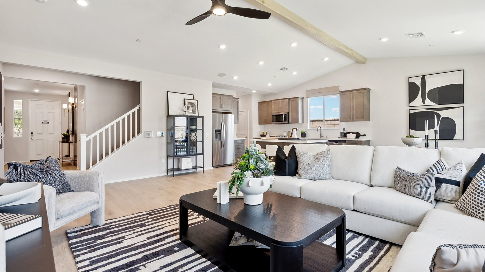 Open-concept great room, dining space, and kitchen