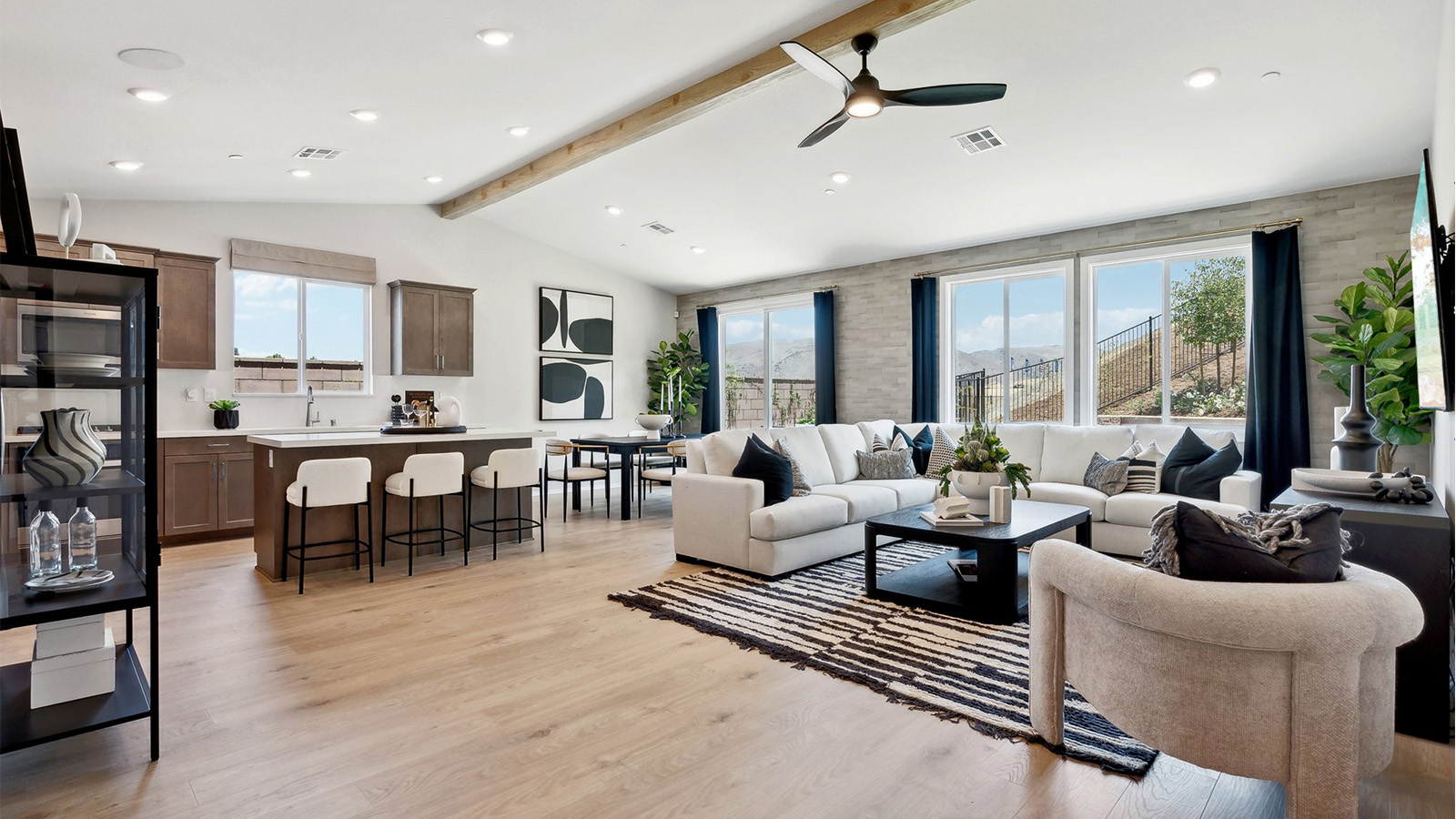 Open-concept great room, dining space, and kitchen