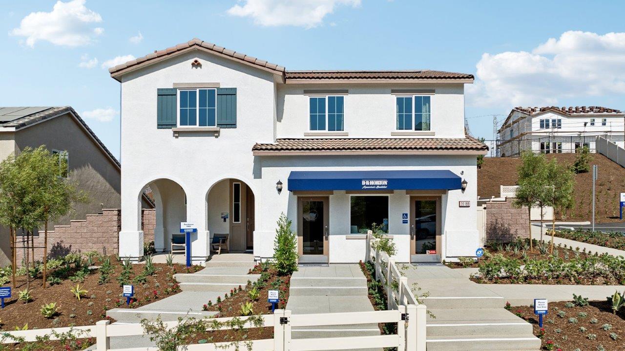 Exterior image of a two story home with a covered entry