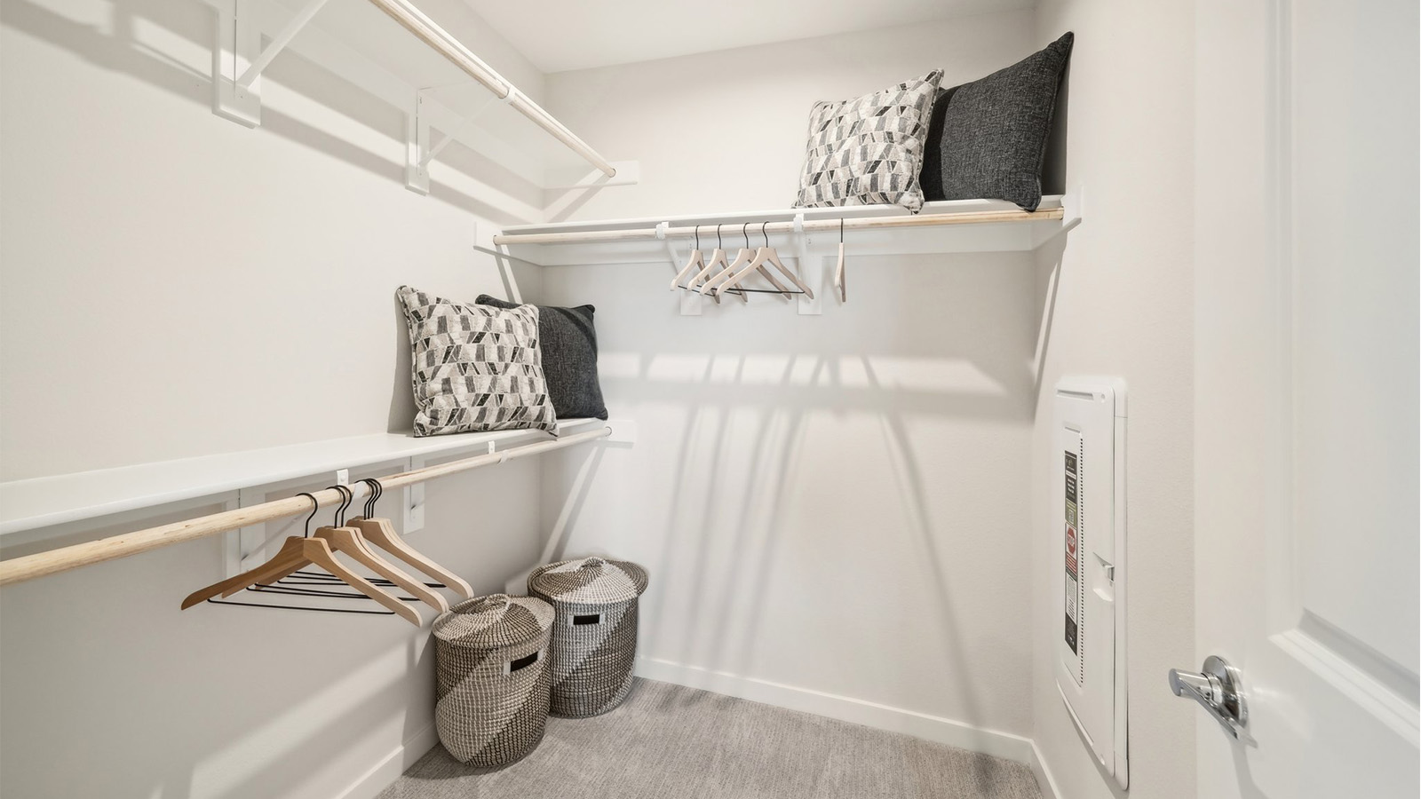 Primary bedroom walk-in closet