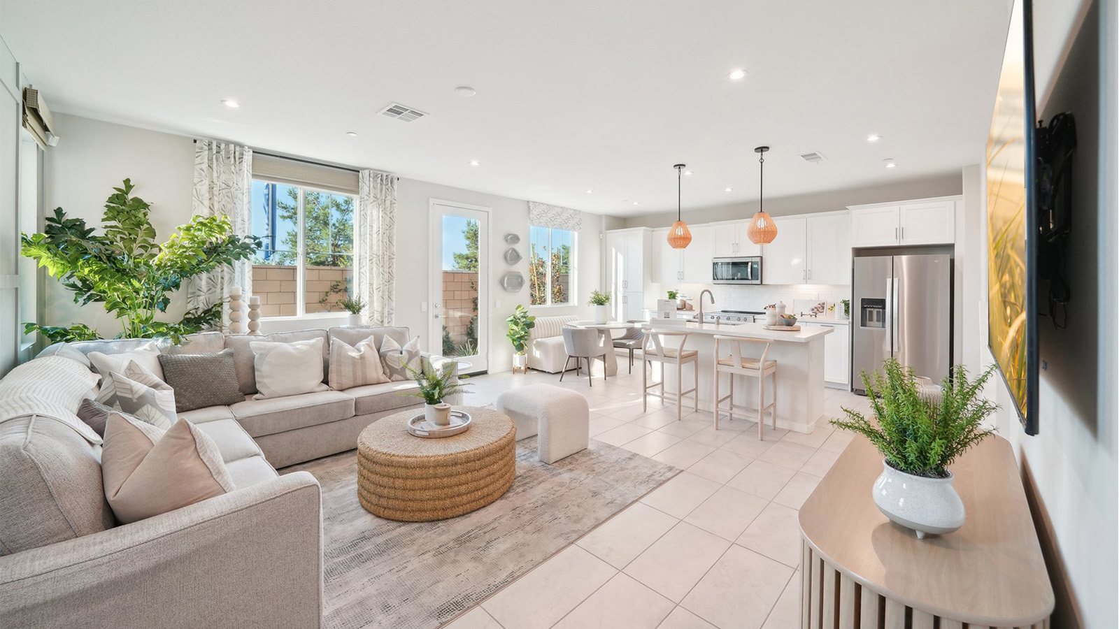 Spacious open-concept great room, dining room and kitchen