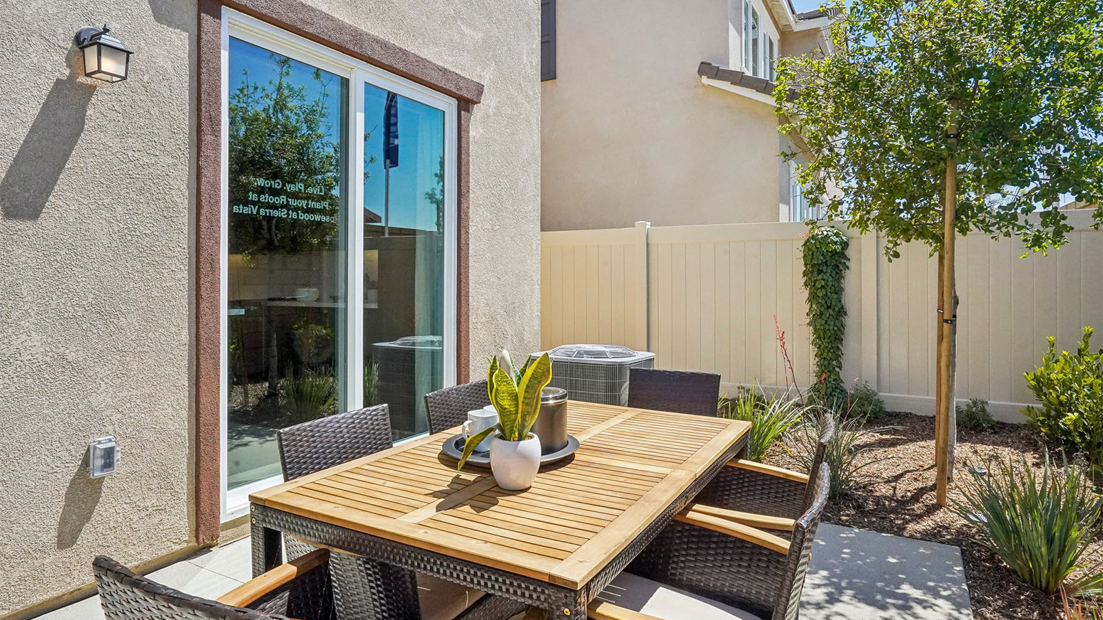 Backyard with turf and patio area
