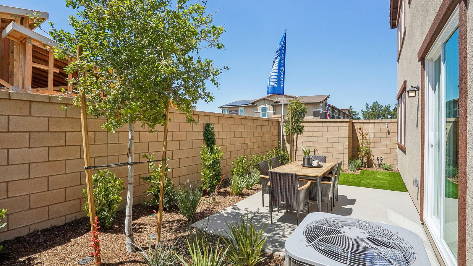 Backyard with turf and patio area