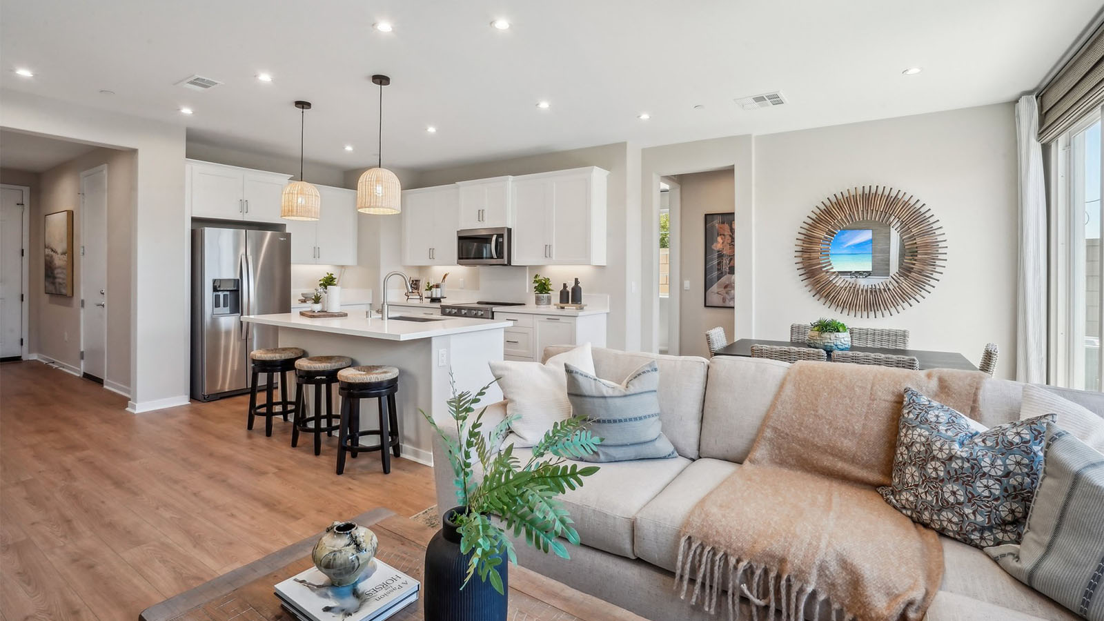 Spacious open-concept great room, dining room and kitchen