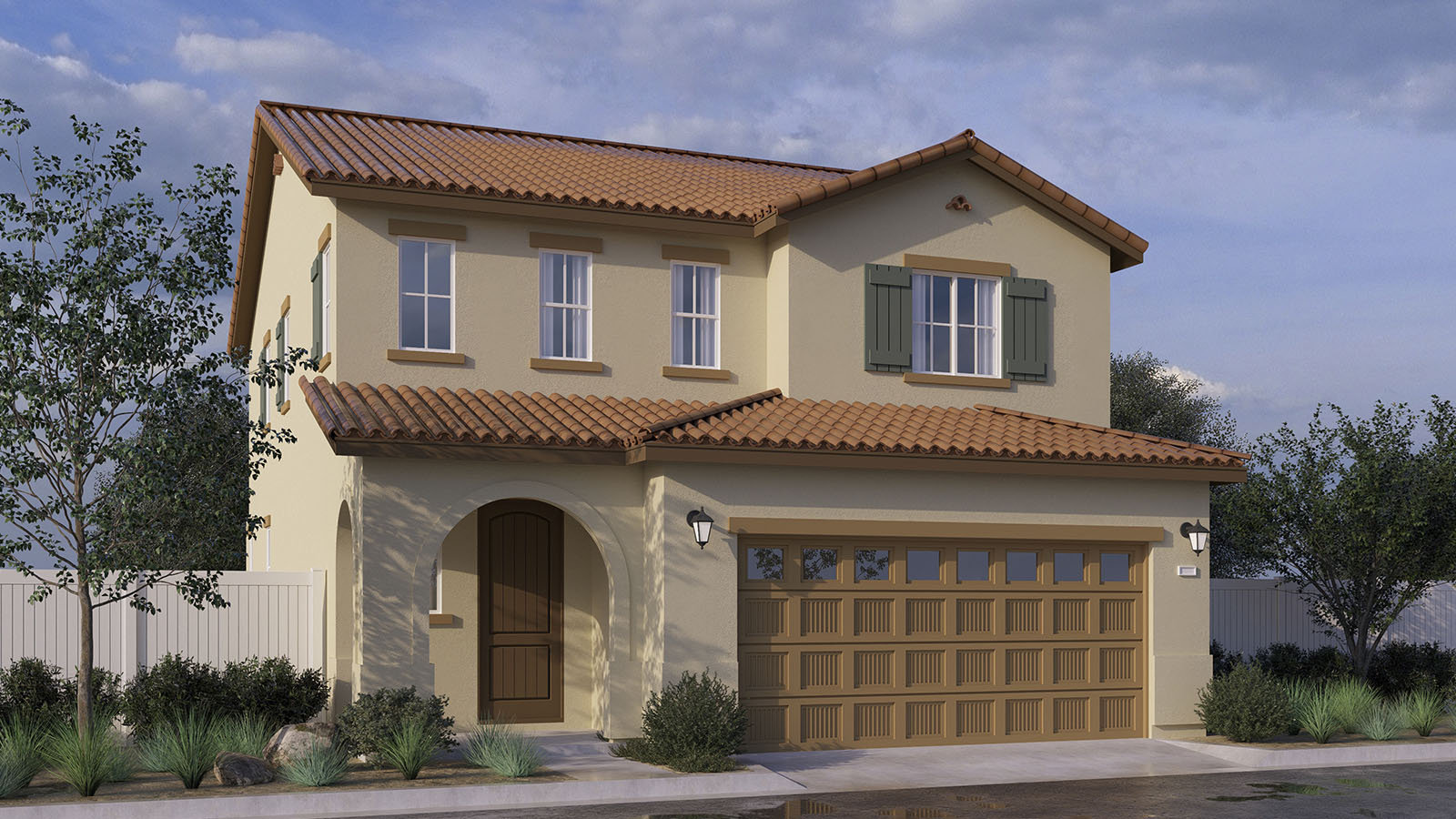 Two-story Spanish home with shutters and two car garage