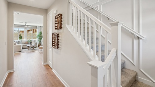 Entry hallway with open stairs