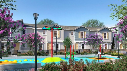 Community park with townhome building in background