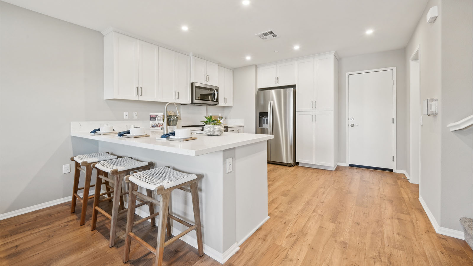Modern open-concept dining room, and kitchen