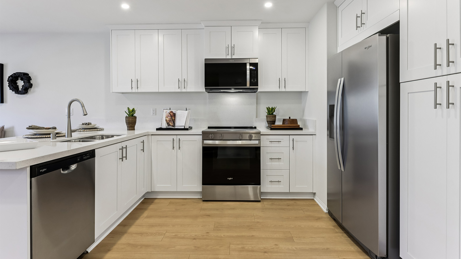 Open-concept kitchen with stainless-steel appliances