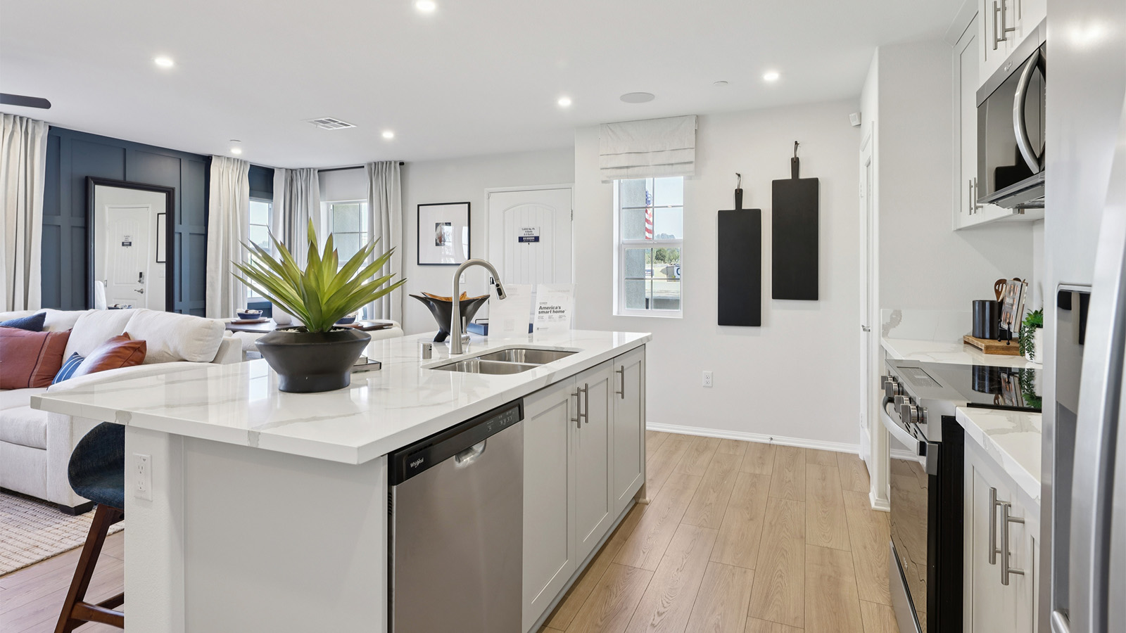 Spacious kitchen with an island and stainless-steel appliances