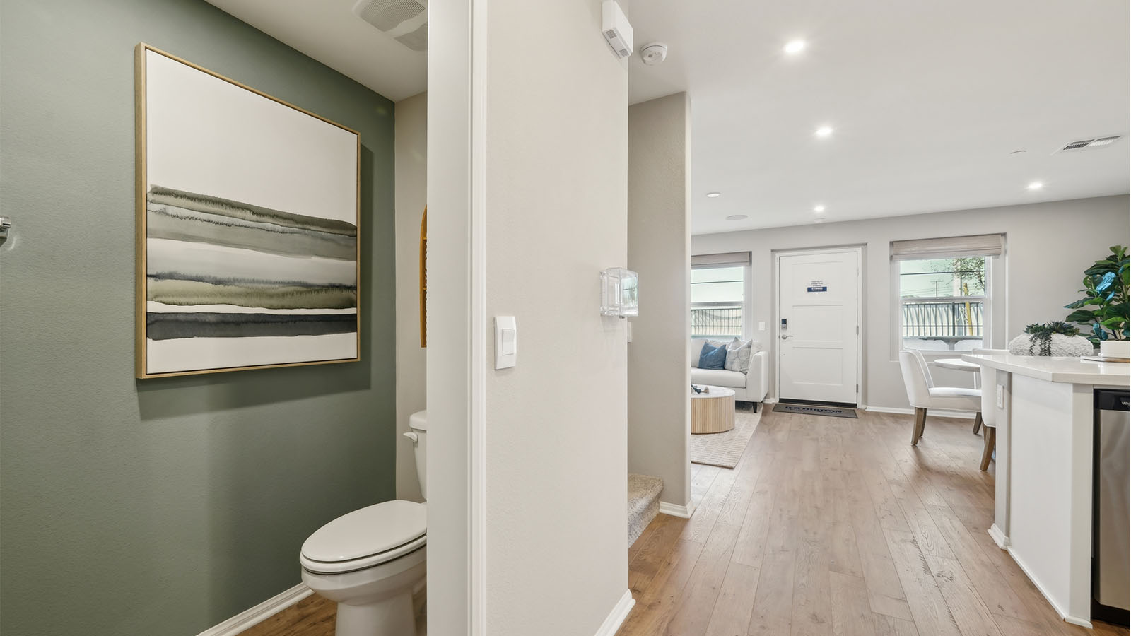 Downstairs hallway leading to bathroom