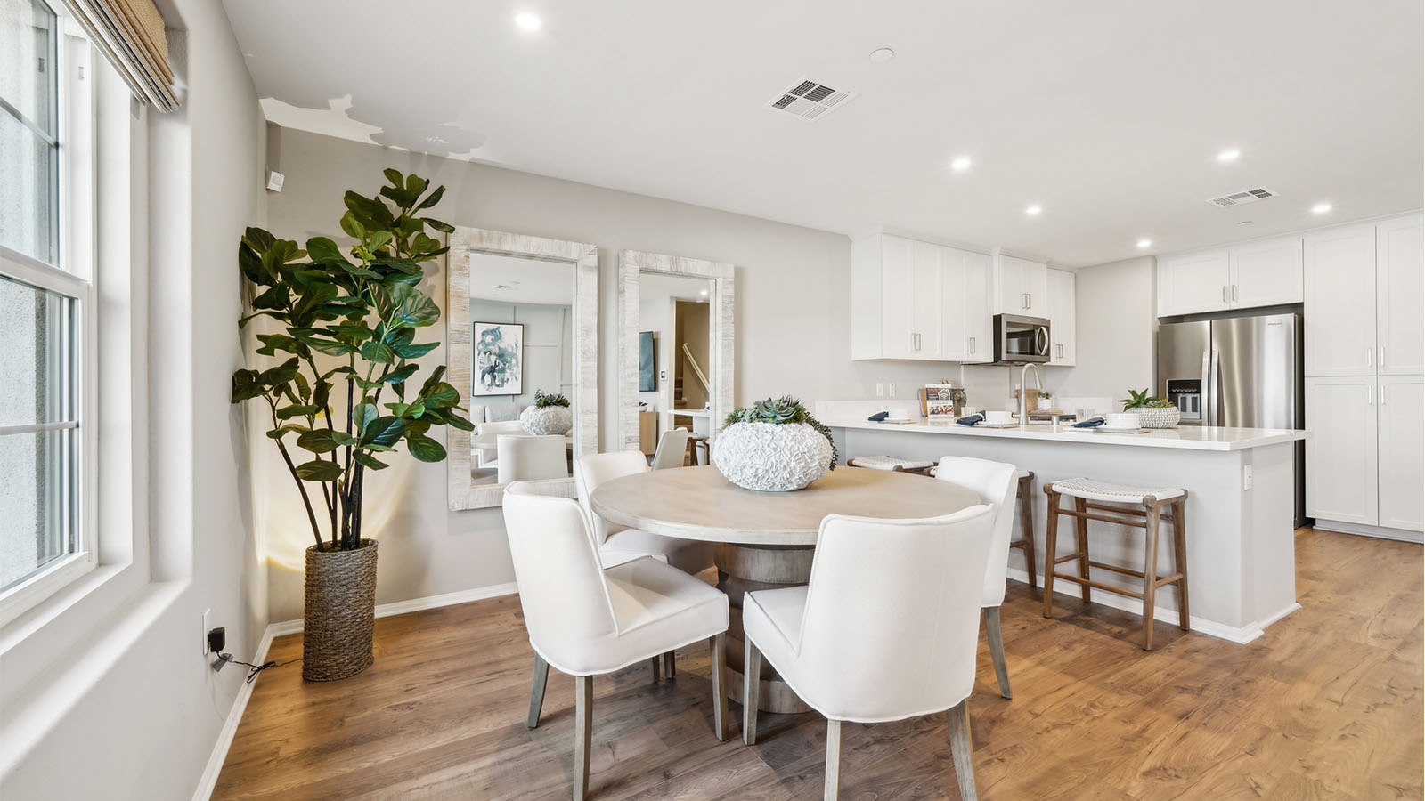Modern open-concept dining room, and kitchen