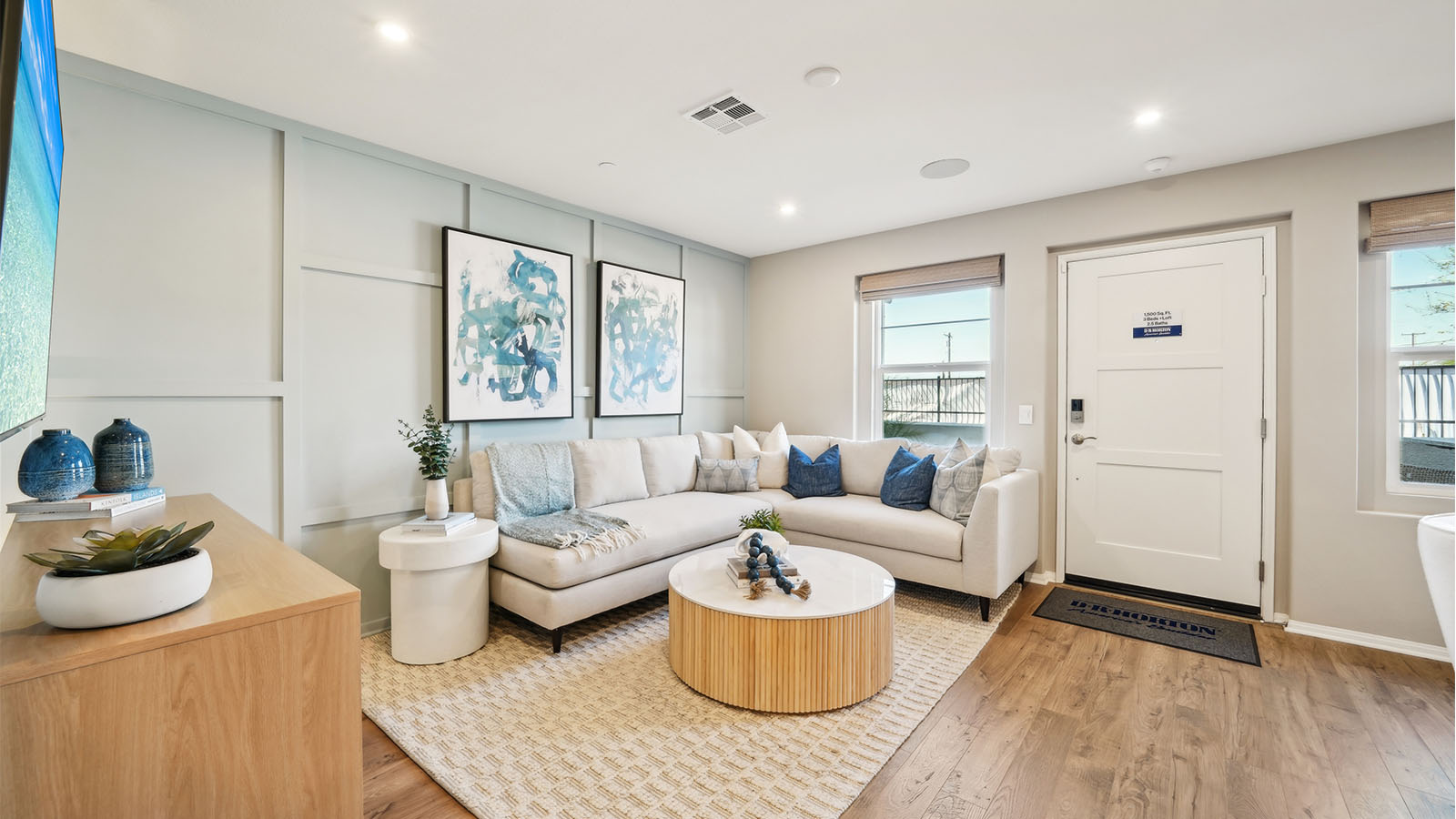 Open-concept great room area and entry door