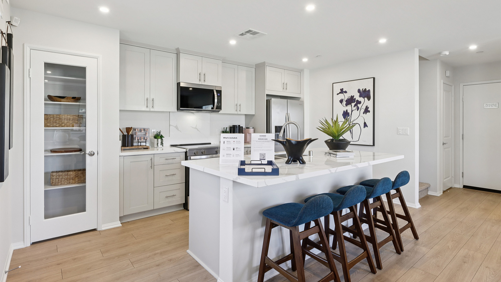 Kitchen with an island and stainless-steel appliances
